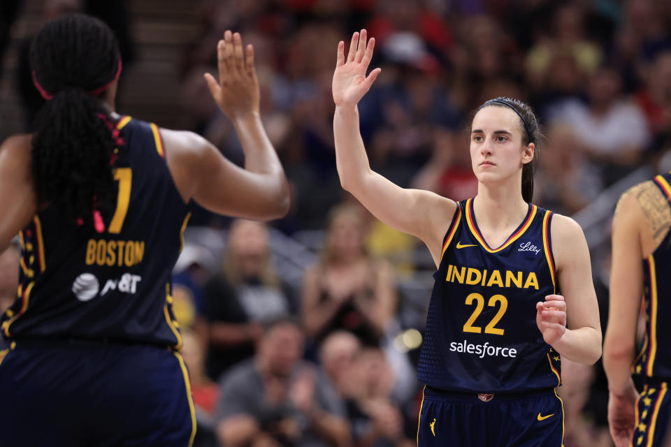 INDIANAPOLIS, INDIANA - SEPTEMBER 15: Caitlin Clark #22 of the Indiana Fever and Aliyah Boston #7 during the game against the Dallas Wings at Gainbridge Fieldhouse on September 15, 2024 in Indianapolis, Indiana. NOTICE TO USER: The User expressly acknowledges, and agrees that, by downloading and or using this photo, the User agrees to the terms and conditions of the Getty Images License Agreement. (Photo by Justin Casterline/Getty Images)